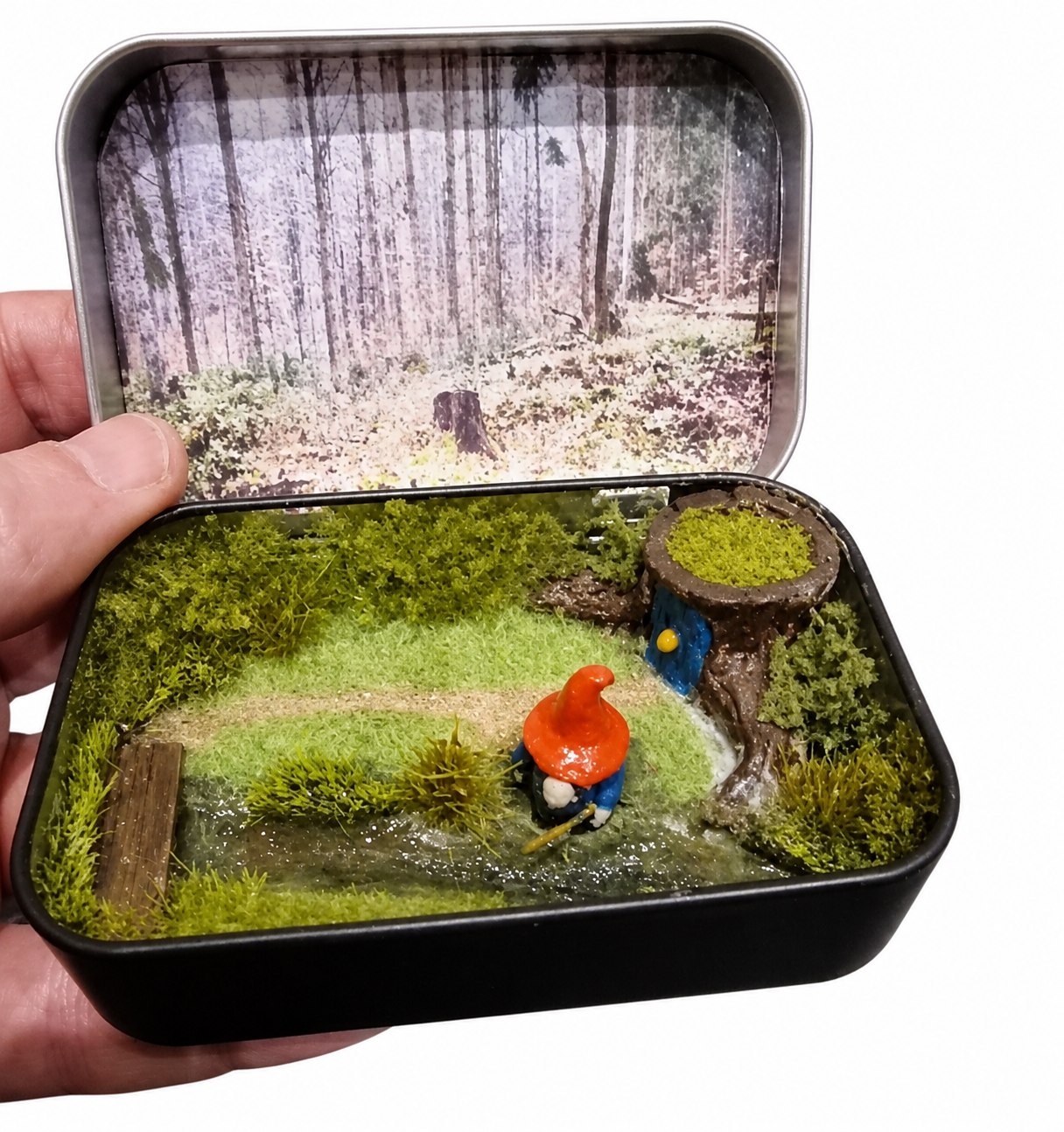 Gnome in a Tin — a handcrafted miniature diorama of a woodland gnome's cosy home, sealed inside a pocket-sized tin
